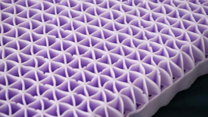 Purple's pillow core is Smart Comfort Grid made with their Hyper-elastic Polymer
