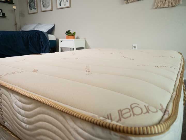 A wide shot of the organic cotton cover for the Saatva Youth mattress.